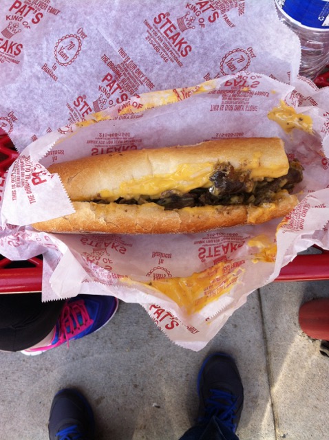 A photo of a Philly Cheesesteak with cheese wiz